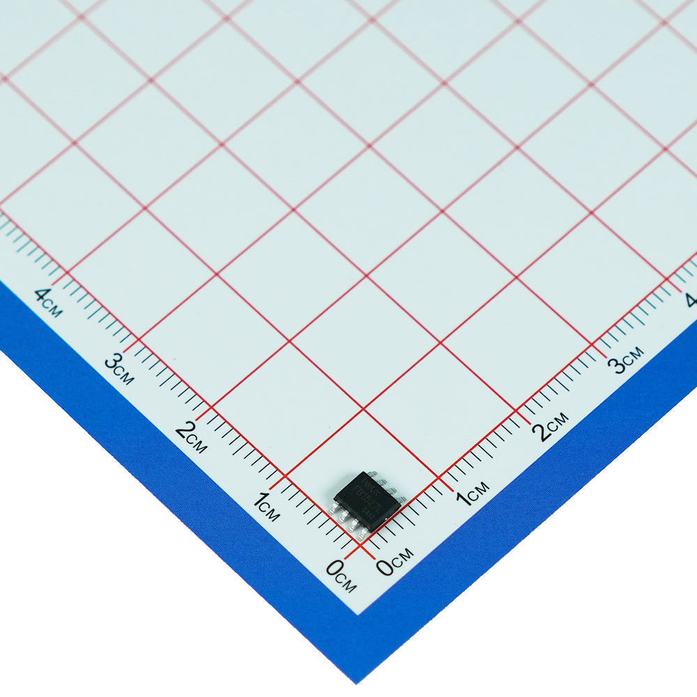 LBT17 transmitter IC photographed against a centimeter scale