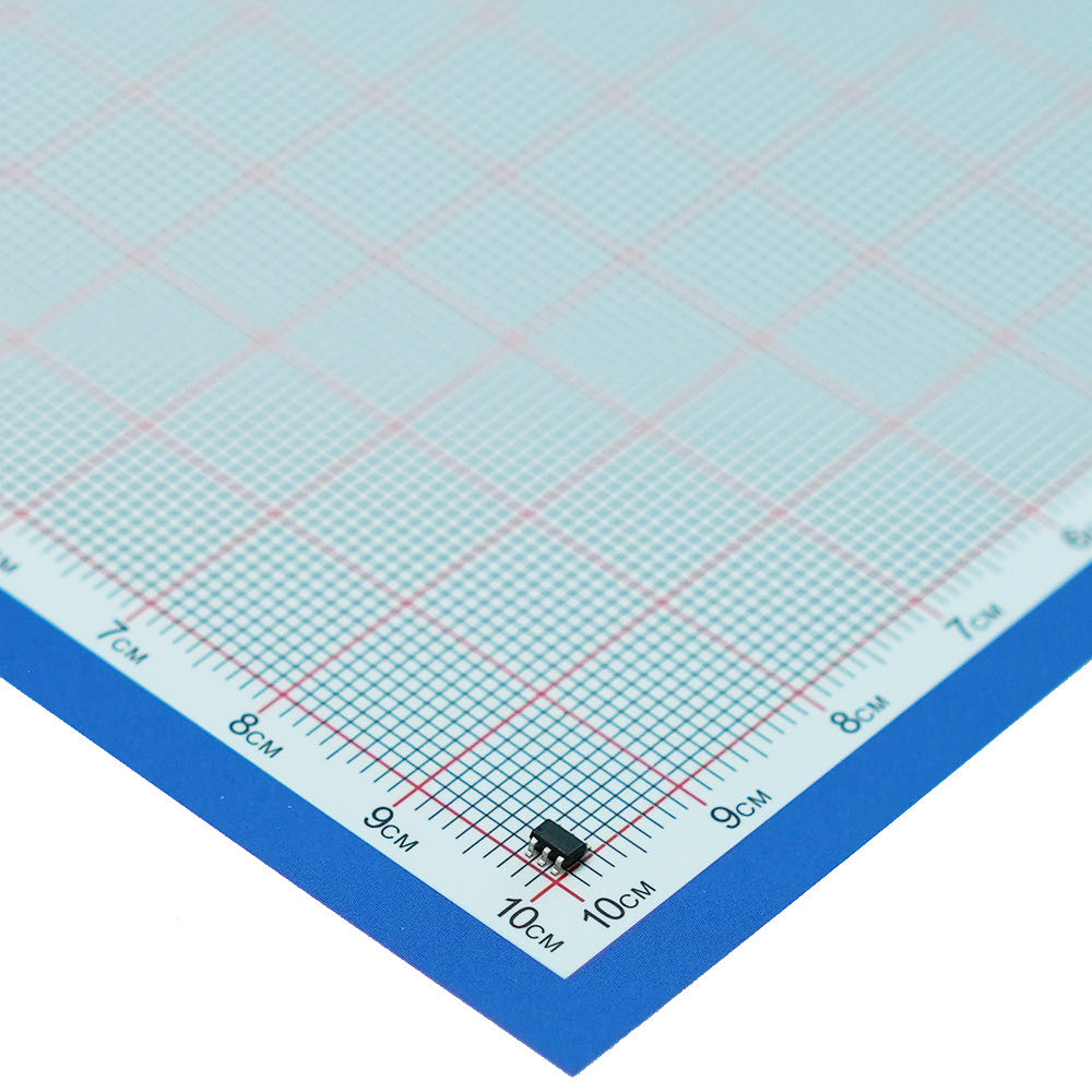 LR690L receiver IC photographed against a centimeter scale