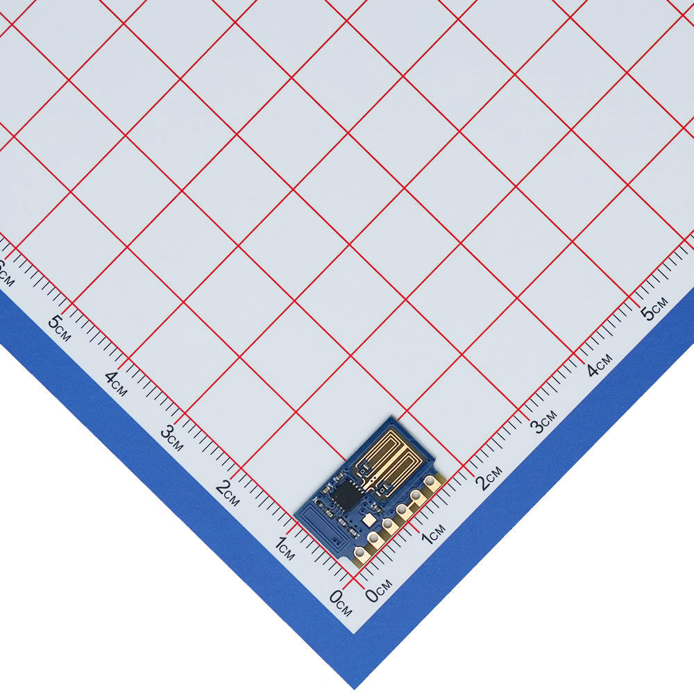 Wei-R3 receiver module photographed against a centimeter scale